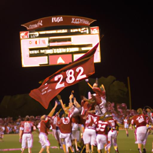 The Razorback team proudly showcasing their impressive game score banner.